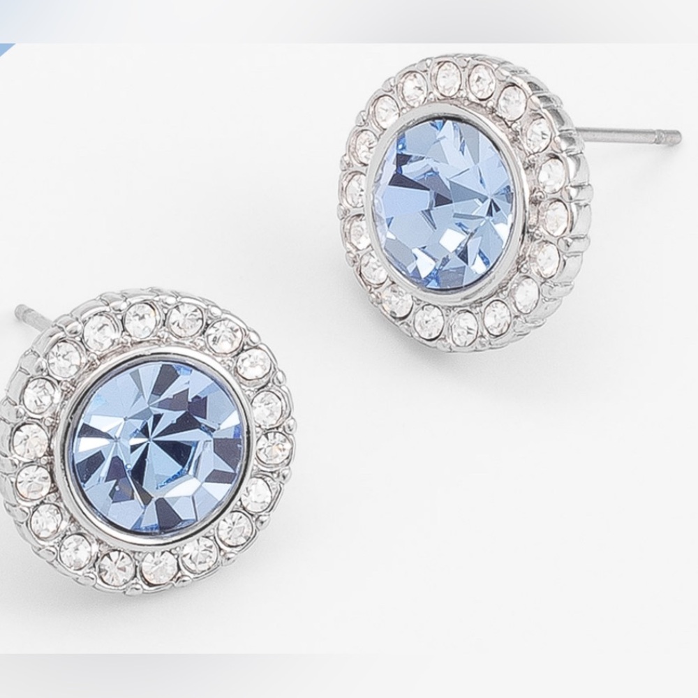Sparkling and elegant rhodium plated post earrings with ice blue crystals NWT